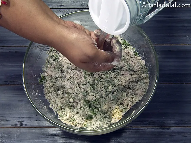 Step 29 – Gradually add water for kneading.&nbsp;