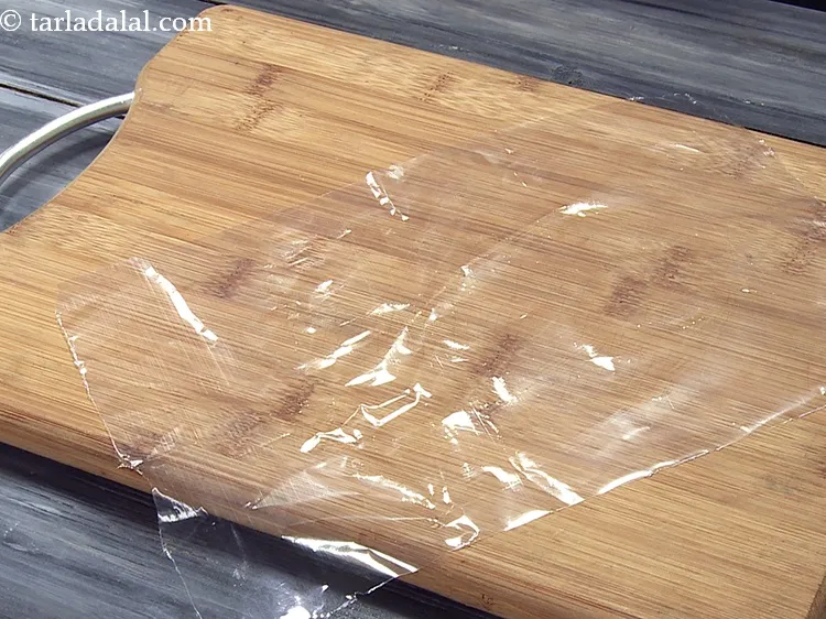 Step 33 – Place a thick plastic sheet on a flat board or a flat surface.&nbsp;