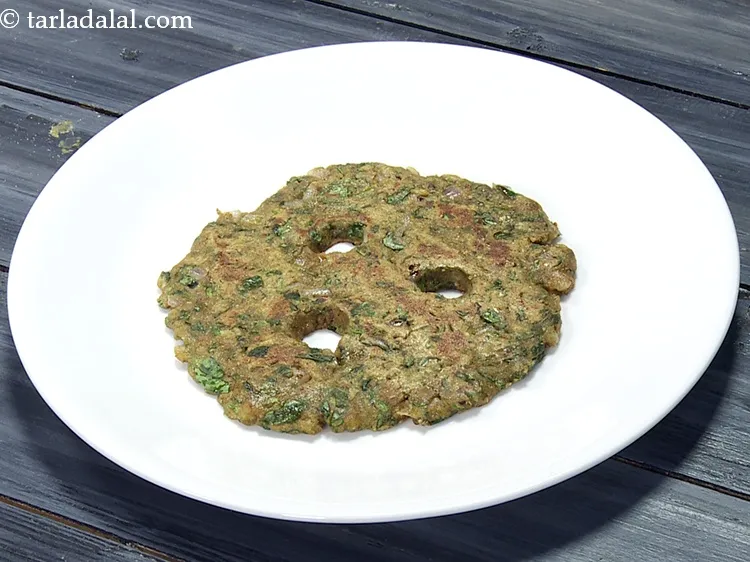 Step 45 – Remove the thalipeeth on a plate.&nbsp;