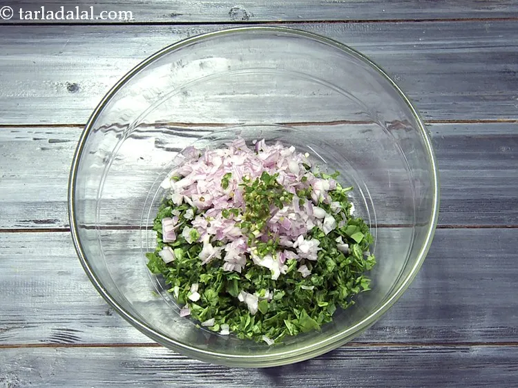 Step 18 – Add 1 tsp&nbsp;finely&nbsp;<a href="https://www.tarladalal.com/glossary-chopped-green-chilli-820i">chopped green chillies</a>.