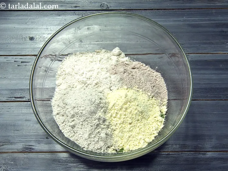 Step 22 – Add 1/4 cup&nbsp;<a href="https://www.tarladalal.com/glossary-besan-chana-dal-flour-bengal-gram-flour-952i">besan (bengal gram flour)</a>.