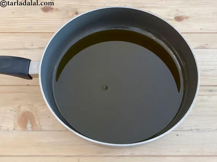 Step 34 – The mustard oil has to be heated till it smokes on a high flame and …