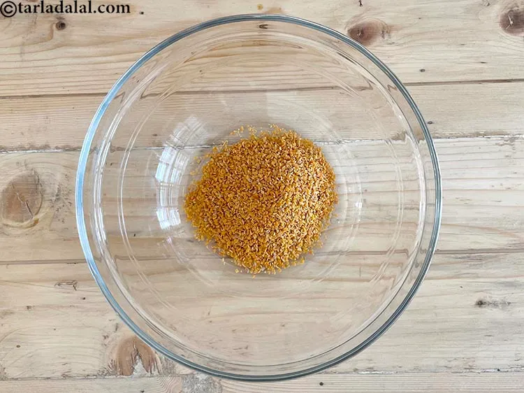 Step 16 – In a deep glass bowl put&nbsp;<meta charset="UTF-8" />1/4 cup&nbsp;<a href="glossary-split-fenugreek-seeds-methi-na-kuria-methi-dal-kuria-945i">split fenugreek seeds (methi na kuria)</a>. …