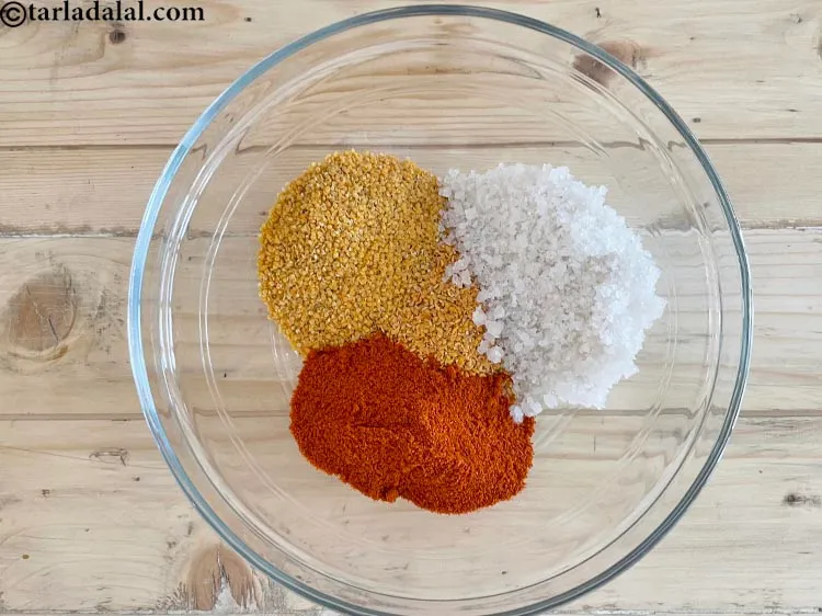 Step 19 – Add&nbsp;<meta charset="UTF-8" />5 tbsp&nbsp;<a href="glossary-chilli-powder-red-chilli-powder-339i">chilli powder</a>.