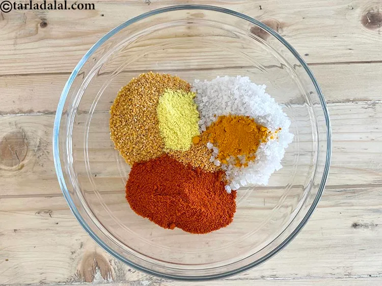 Step 21 – Add&nbsp;<meta charset="UTF-8" />1/2 tsp&nbsp;<a href="glossary-turmeric-powder-haldi-645i">turmeric powder (haldi)</a>.