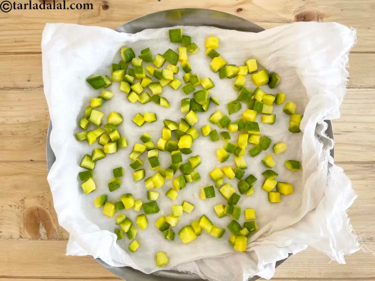 Step 13 – Take a big flat round plate, put a muslin cloth on top. We have used …