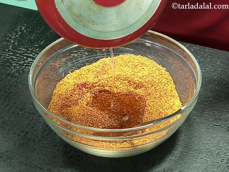 Step 13 – Pour the oil.