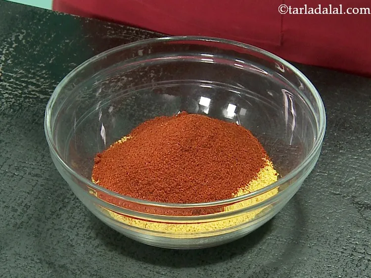 Step 8 – Add chilli powder. For a bright red colour, make use of Kashmiri red chili powder.