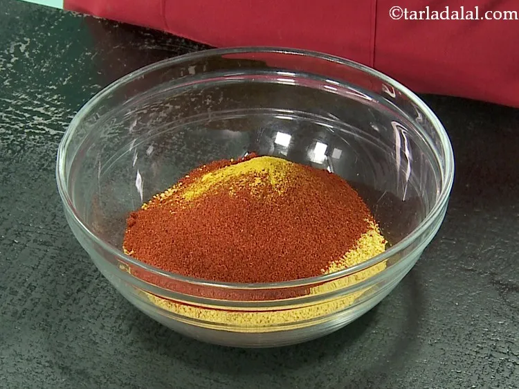 Step 9 – Add turmeric powder.
