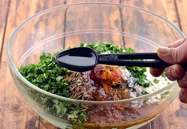 Step 13 – Also 3 tbsp oil. This will make the <strong>Methi Theplas </strong>soft.