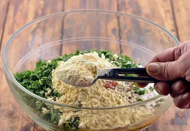 Step 15 – Furthermore, add the besan (bengal gram flour). You can also add other flours like bajra …