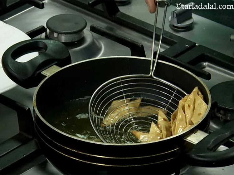 Step 19 – Deep-fry a few tortilla chips at a time on a medium flame till they are …