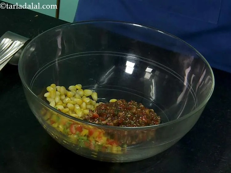 Step 22 – Add the sweet corn kernels to the salsa. Also add the finely chopped colored capsicum. …