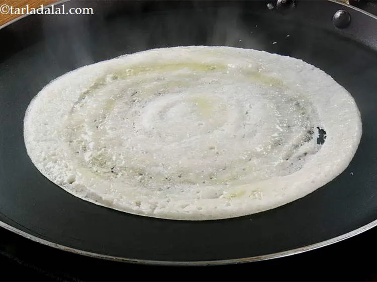 Step 18 – Cook on a medium flame till it turns slightly crisp and golden brown in colour.