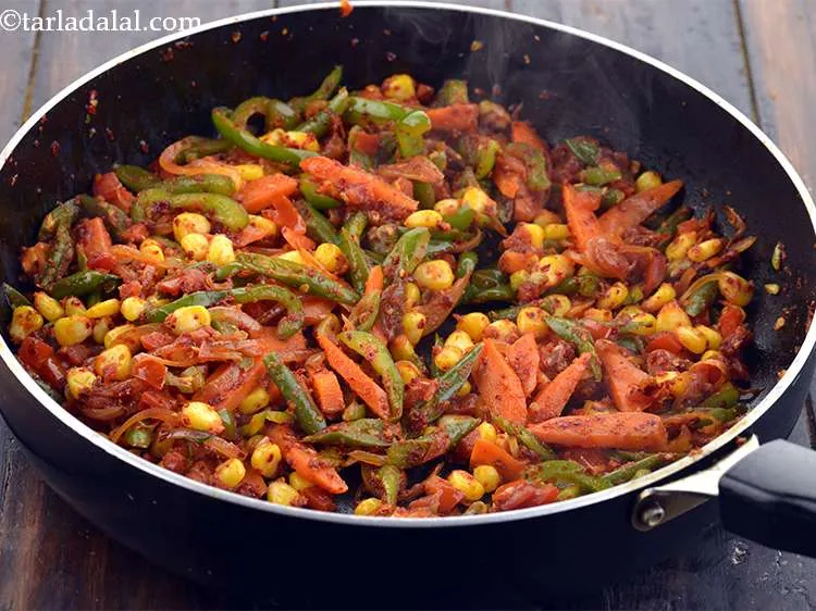 Step 28 – Mix well and cook on a medium flame for 1 to 2 minutes, while stirring …