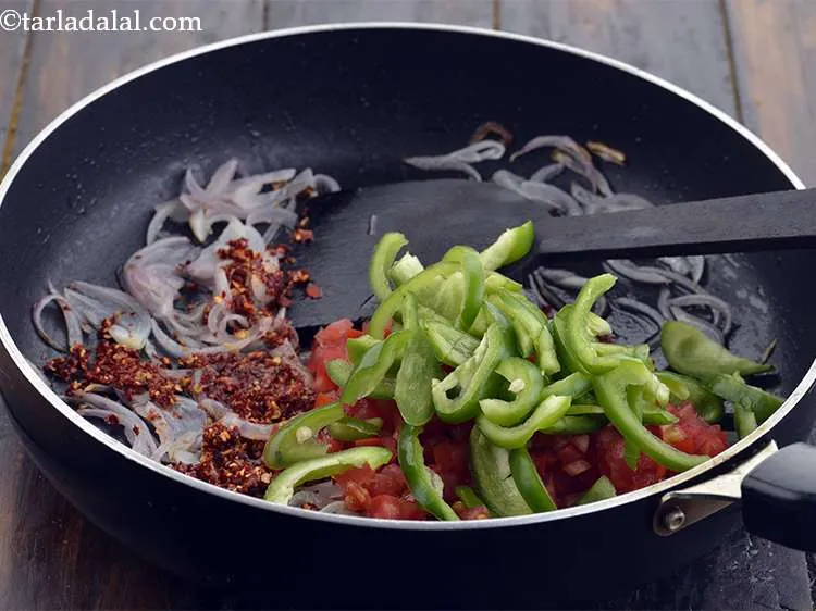 Step 48 – Then add 1/2 cup&nbsp;thinly&nbsp;<a href="https://www.tarladalal.com/glossary-sliced-capsicum-165i">sliced capsicum</a>. The capsicum will not only give a green color, …