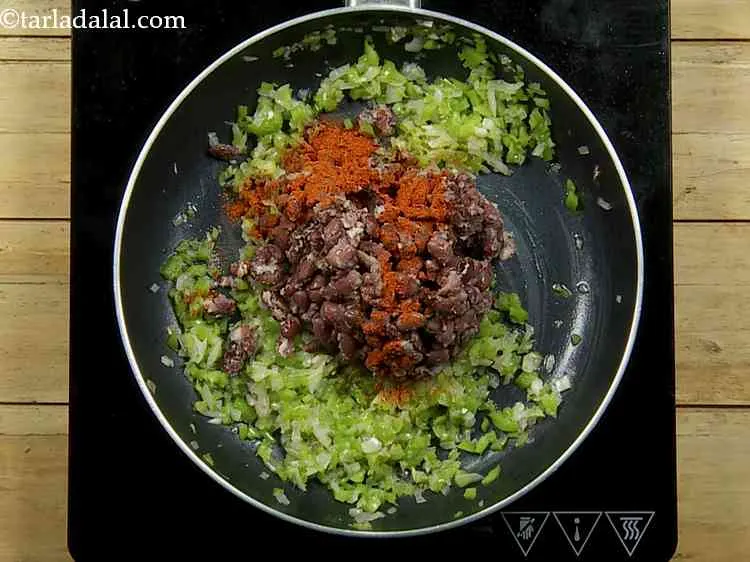 Step 6 – Add the chili powder. You can substitute it with chili flakes.