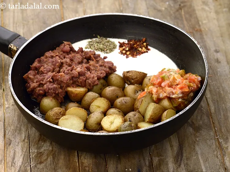 Step 35 – Add <a href="https://www.tarladalal.com/glossary-salt-namak-table-salt-418i">salt</a>&nbsp;to taste.