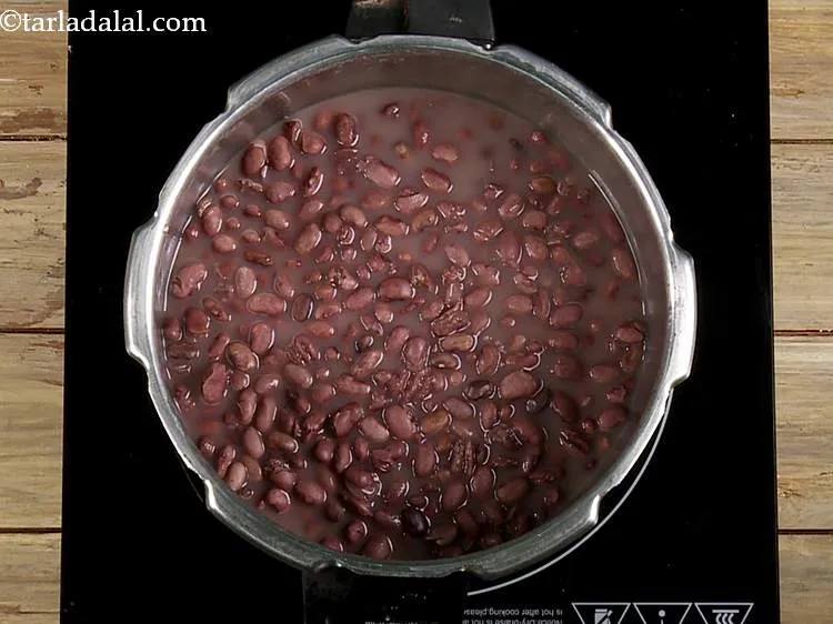 Step 17 – Shut the lid and pressure cook for 4 whistles. Allow the steam to escape before …