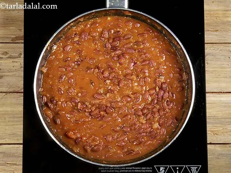 Step 29 – Mix well till the beans are incorporated into the sauce.