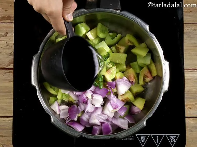 Step 37 – Add &frac12; cup of water to the pressure cooker, mix well and pressure cook for …