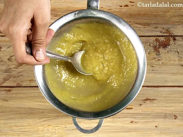 Step 42 – Pour the mixture into the strainer and strain it.