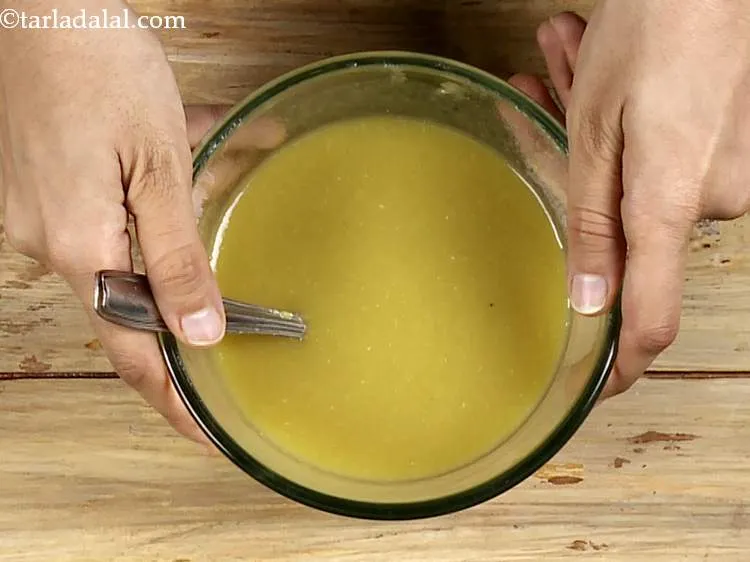 Step 44 – To this, add the vinegar, mix well and keep aside.