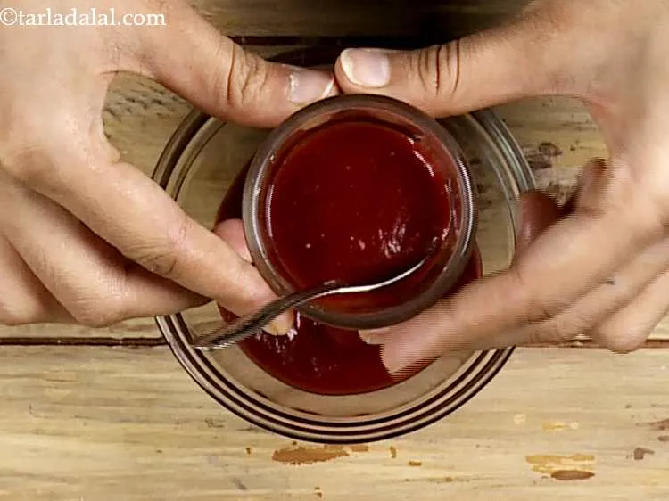 Step 46 – Add the chilli sauce to it.