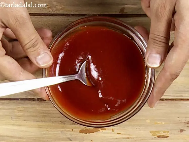 Step 47 – &nbsp;Mix well and keep aside. This is a spicy-sweet red sauce for the<strong> Mexican Tacos</strong>.