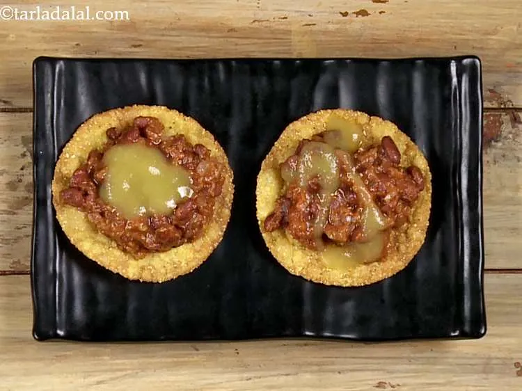 Step 50 – Pour 2 tsp of the green sauce over it.