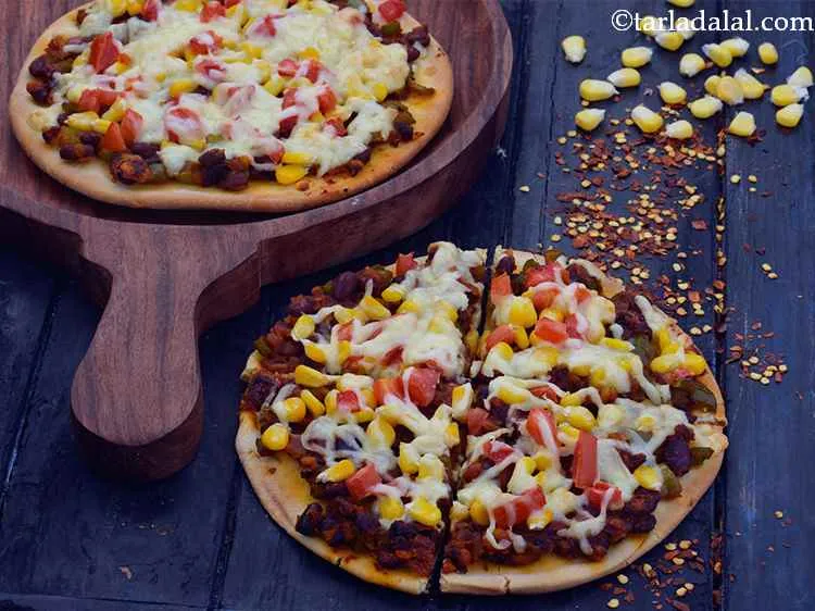 Step 15 – Cut them into slices, garnish with chilli flakes and serve immediately. Also, a dash of …