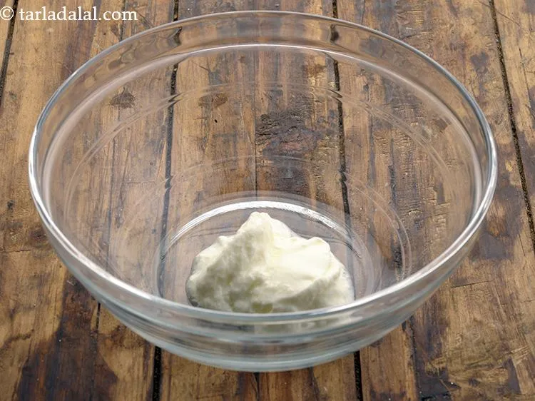 Step 2 – To begin making the batter for <strong>microwave chocolate sponge cake</strong>, in a bowl take curd. …