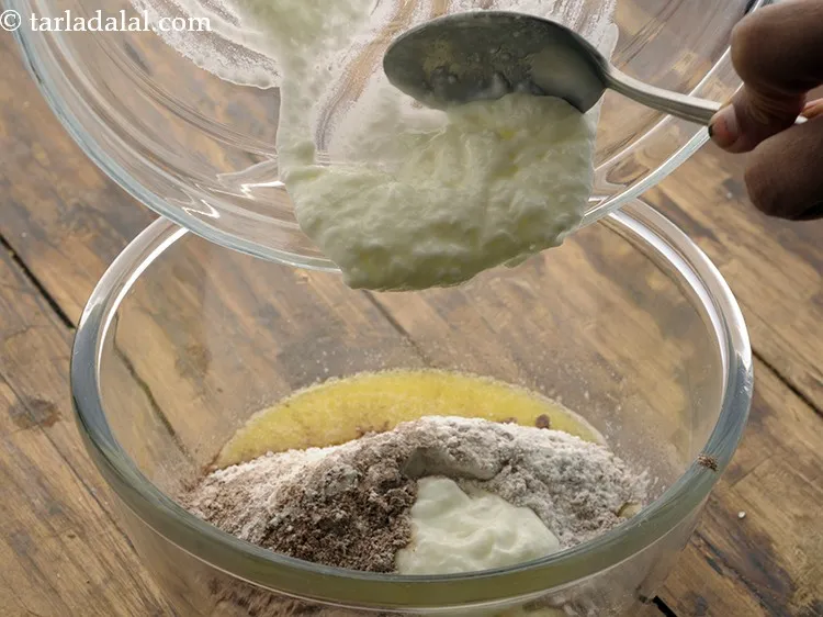 Step 13 – Add curd-baking soda mixture.