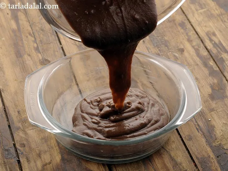 Step 17 – Spoon the cake batter into it and&nbsp; gently tap to pop any air bubbles.
