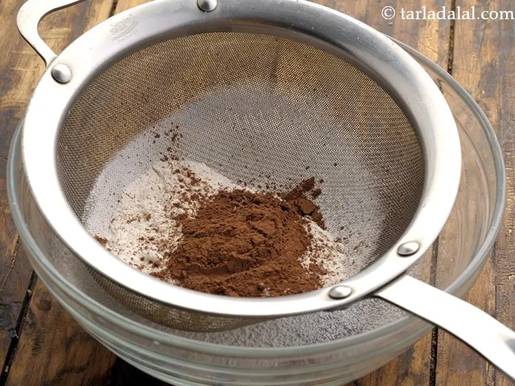 Step 6 – Add cocoa powder. Using a good quality dark cocoa powder is very important to get …