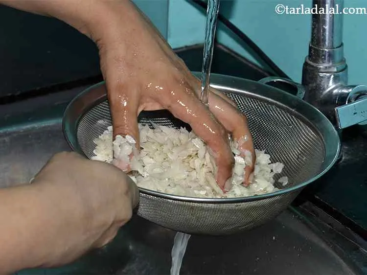 Step 3 – To wash the poha, the first step is to clean and place&nbsp;2 cups&nbsp;<a href="https://www.tarladalal.com/glossary-thick-beaten-rice---jada-poha-2455i">thick beaten …