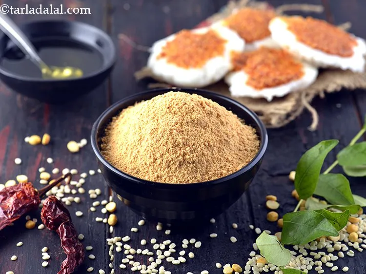 Step 19 – <strong>Idli podi/ Milagai podi</strong> is generally mixed with ghee, sesame oil or garlic infused oil …
