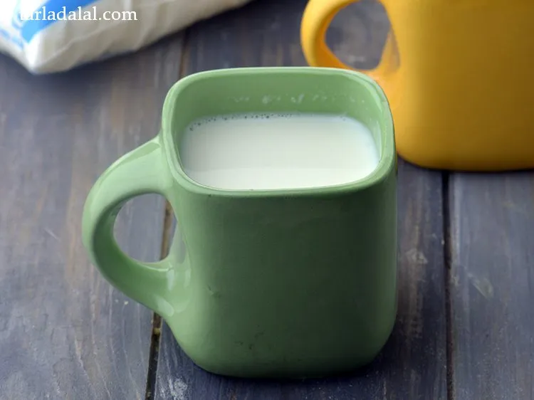Step 24 – Add 1 tbsp&nbsp;<a href="https://www.tarladalal.com/glossary-milk-514i">milk</a>.