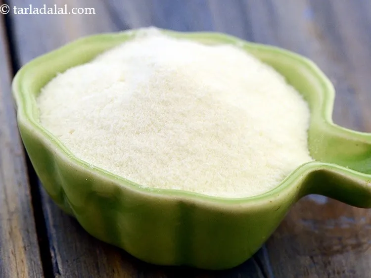 Step 13 – Add 1/4 cup&nbsp;<a href="https://www.tarladalal.com/glossary-milk-powder-517i">milk powder</a>. This adds thickness and body to the ice cream.