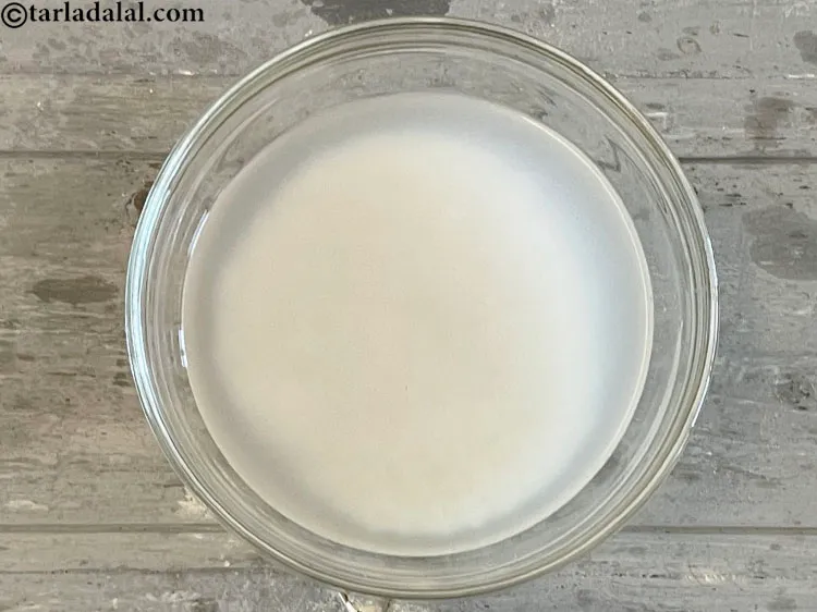 Step 24 – Wash rice in water to remove dirt.