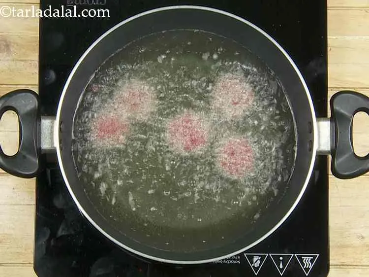 Step 15 – Heat the oil in a deep kadhai and deep-fry the tikkis, a few at a …