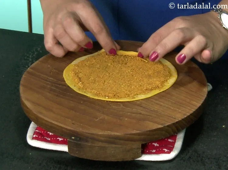 Step 46 – Immediately start rolling very tightly from one end of the circle.