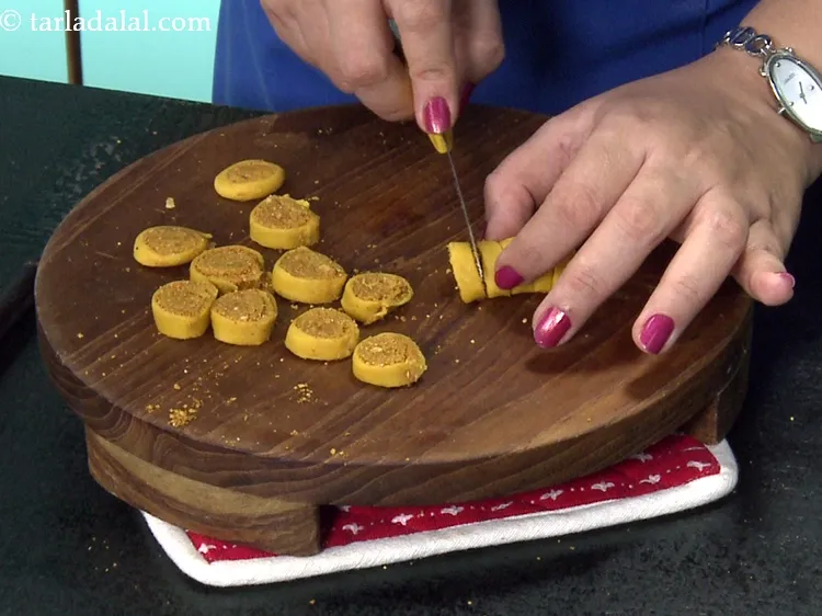 Step 51 – Now cut it into 16 to 18 equal roundels using a knife.