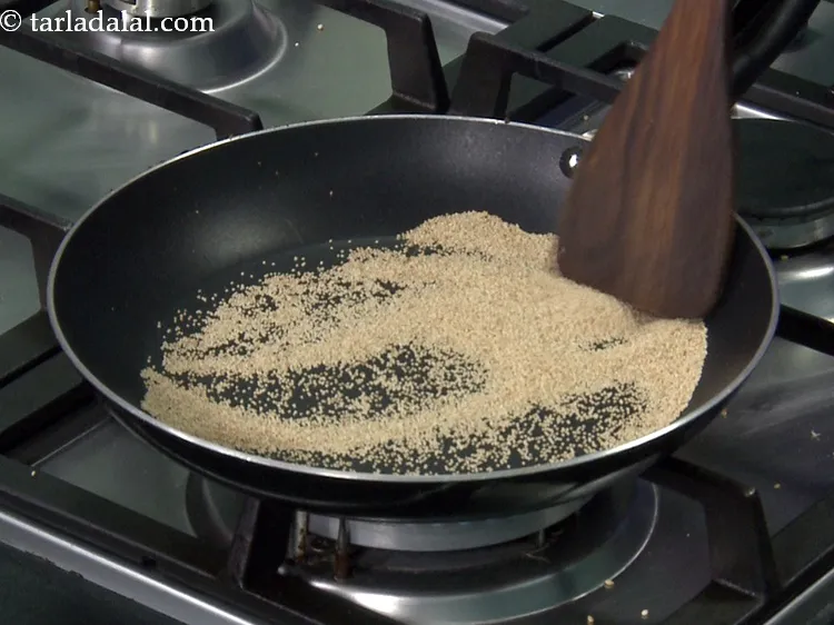 Step 21 – Dry roast on a medium flame for 30 seconds or till they turn light brown …