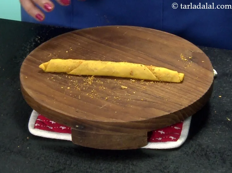 Step 48 – This is how it looks after it is completely rolled. It will form a cylindrical …