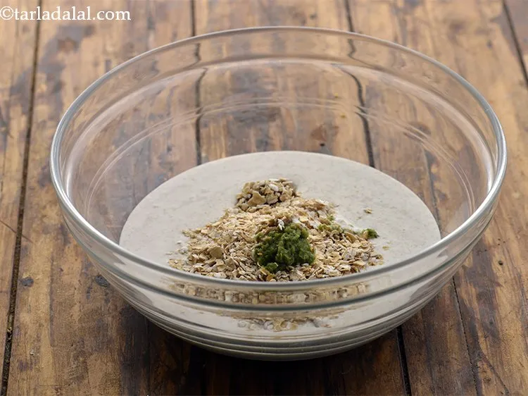 Step 24 – Add 1 tsp&nbsp;<a href="https://www.tarladalal.com/glossary-green-chilli-paste-hari-mirch-ki-paste-mirchi-paste-333i">green chilli paste</a>.