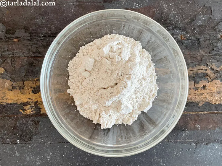 Step 13 – In a bowl put&nbsp;<meta charset="UTF-8" />1&nbsp;cup&nbsp;<a href="glossary-jowar-flour-jowar-ka-atta-white-millet-flour-sorghum-flour-483i">jowar (white millet) flour</a>.