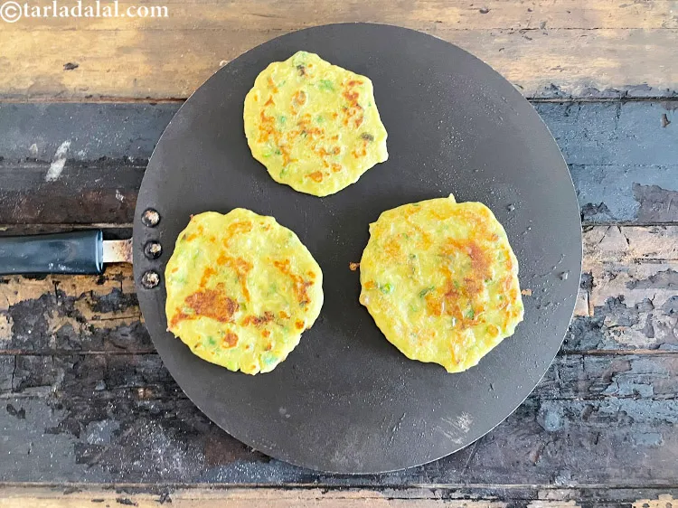 Step 41 – &nbsp;Let the othe side cook till<strong>&nbsp;jowar uttpam |&nbsp;healthy jowar uttpam&nbsp;|&nbsp;&nbsp;sorghum flour pancake&nbsp;|&nbsp;jowar flour snack recipe&nbsp;|</strong>&nbsp;is<strong>&nbsp;</strong>golden …