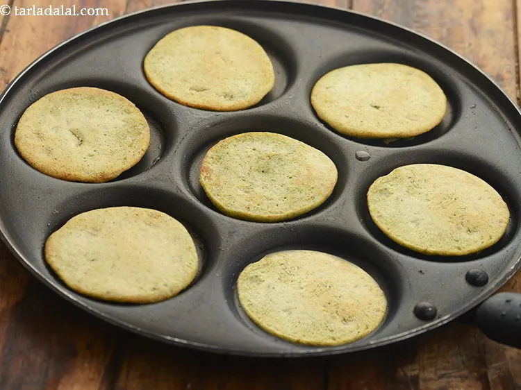 Step 22 – Turn them around and cook them till they turn golden brown in colour from other …