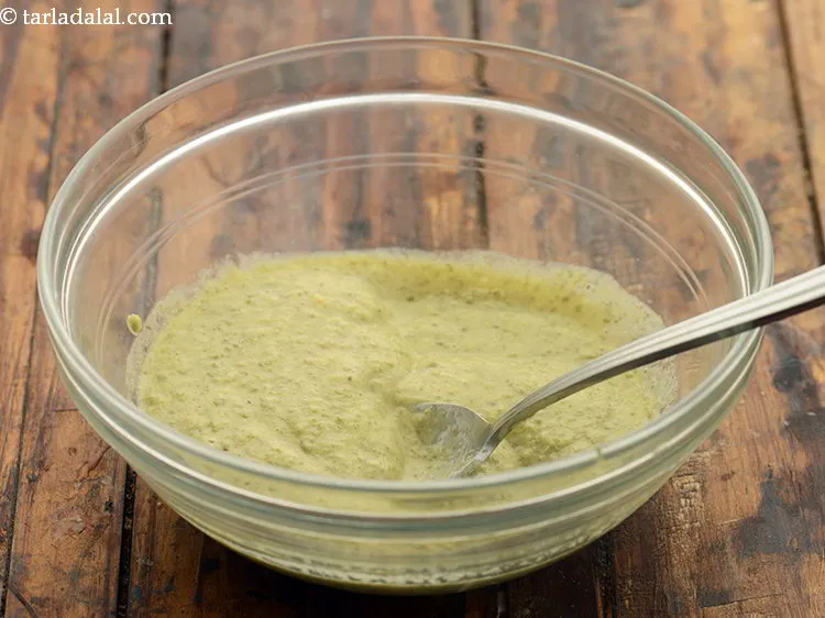 Step 18 – Mix well using a spoon. The batter for <strong>moong dal pancake for toddlers</strong> is ready.
